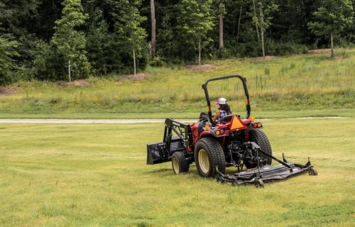 sm240h with mower rear view from a distance